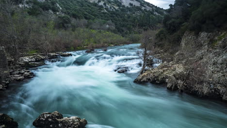 Time-lapse-of-the-river-Herault-with-a-fisherman-a-long-exposure-shot.